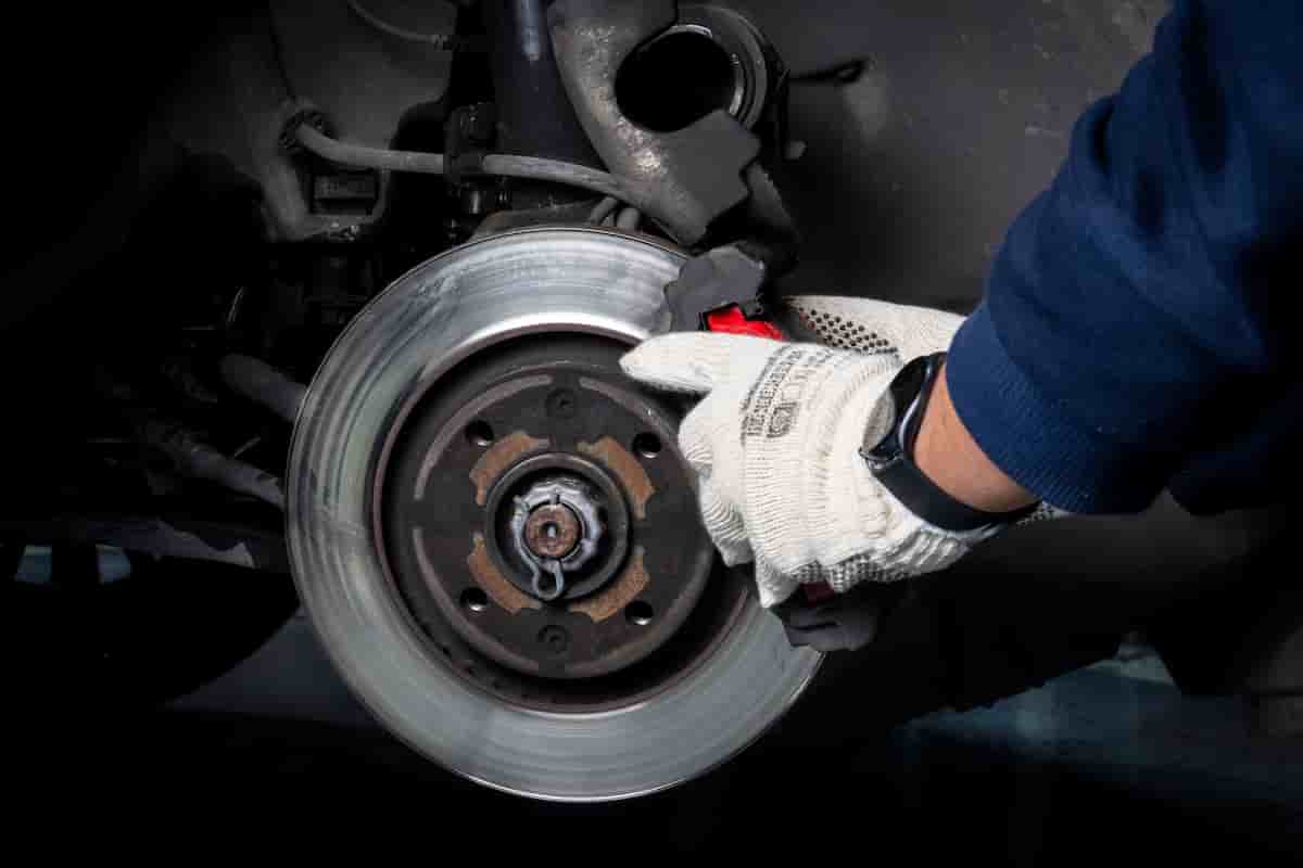 Brake pad and rotor replacement in a driveway in Hinesville Georgia